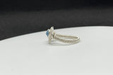 This elegant ring features a stunning Aquamarine gemstone bead set in high-quality Argentium silver, known for its bright finish and tarnish resistance. The serene blue hues of the Aquamarine evoke the calming essence of the sea, making this piece both soothing and sophisticated. Designed in a size 8, this ring is perfect for those seeking a blend of natural beauty and modern elegance. Ideal for everyday wear or special occasions, it adds a refreshing touch to any jewelry collection.