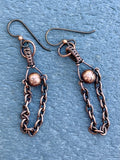 These Hypoallergenic Copper Ball and Chain Earrings feature a sleek and modern design that combines the elegance of copper with hypoallergenic materials. These earrings are crafted with copper balls and delicate chains, offering a stylish and minimalist look. Designed for comfort and sensitivity, they are an excellent choice for individuals with metal allergies or sensitivities.