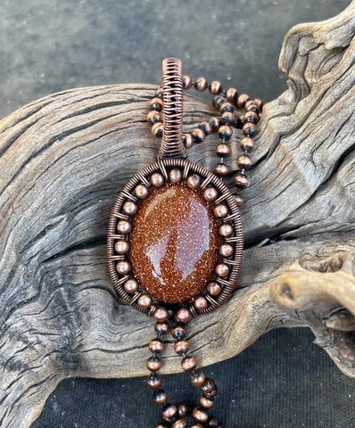 Wire wrapped Copper and Goldstone Necklace