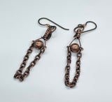 These Hypoallergenic Copper Ball and Chain Earrings feature a sleek and modern design that combines the elegance of copper with hypoallergenic materials. These earrings are crafted with copper balls and delicate chains, offering a stylish and minimalist look. Designed for comfort and sensitivity, they are an excellent choice for individuals with metal allergies or sensitivities.