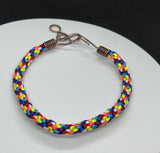 This Adjustable Colorful Satin Nylon Kumihimo Bracelet features a vibrant and stylish design created using the traditional Japanese kumihimo braiding technique. Made with colorful satin nylon cords, this bracelet is not only visually striking but also offers versatility with its adjustable fit.