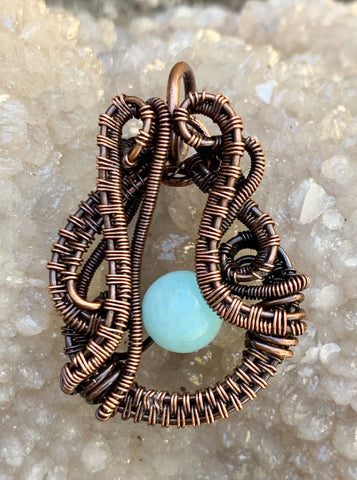 Intricately Woven Copper and Amazonite Pendant.
