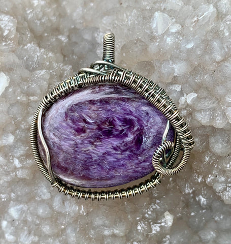 Stunning Purple Charoite Pendant in woven Sterling Silver