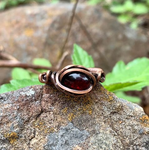 Wire wrapped Copper and Garnet Ring. 
