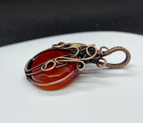 Lovely Orange Carnelian Pumpkin Pendant in Copper with Glass Leaf Accent.