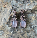 Elegant wire wrapped Copper Earrings with Pink Chalcedony Cabochons and Niobium Ear Wires.