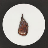 Beautiful Cathedral Agate Pendant in wire wrapped Copper.