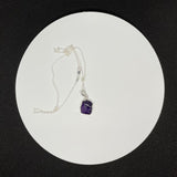 This Necklace features a Rough Amethyst set in Sterling Silver on an 18" Sterling Silver Chain.