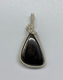 Shimmering Hypersthene Pendant wrapped in handwoven (.925) Sterling and (.999) Fine Silver. 