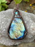 Beautiful Carved Labradorite Pendant in wire wrapped Copper with a Czech Glass Star Accent. 