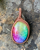 Small Rainbow Quartz (dyed) Cabochon with beautiful pastel colors wrapped in handwoven polished Copper.