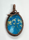 Beautiful Rare Blue Ceruleite Pendant wrapped in handwoven Copper. 