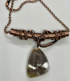 Intriguing Garden Quartz Necklace dangles from a Wire Wrapped Copper Tube Bail. Comes with a 19" Copper Ball Chain. 