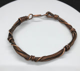 Multiple strands of copper coiled with heavy gauge copper that has been oxidized, polished and sealed. This bracelet is a quick go to fix to complete your everyday outfit. 