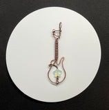 Copper Wire Wrapped Guitar Pendant with Opalite Star Bead.  Perfect for the Rock Star in your life!