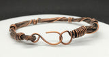 Multiple strands of copper coiled with heavy gauge copper that has been oxidized, polished and sealed. This bracelet is a quick go to fix to complete your everyday outfit. 