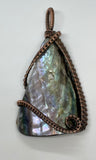 Self collected Iridescent Pen Shell Pendant wrapped in handwoven Copper. 