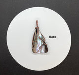 Self collected Iridescent Pen Shell Pendant wrapped in handwoven Copper. 