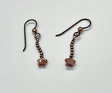 Hypoallergenic Earrings with Goldstone Stars  and Copper Beads with Niobium Ear Wires.