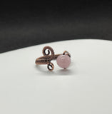 Copper Wire Wrapped adjustable ring with soft, pink Kunzite. 
