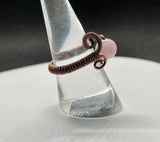 Copper Wire Wrapped adjustable ring with soft, pink Kunzite. 