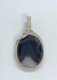 Blue Striped Agate Pendant in wire wrapped Sterling Silver