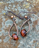 Wire wrapped Copper Earrings with Red Tiger Eye and Niobium Ear Wires. 
