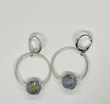 Sterling Silver (.925) Hoop Earrings with Faceted Orbit Crystals. 