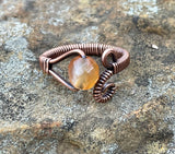 Adjustable Wire Wrapped Copper and Faceted Carnelian Ring.