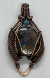 Beautiful Boulder Opal Pendant in wire wrapped copper with an Aquamarine accent. 