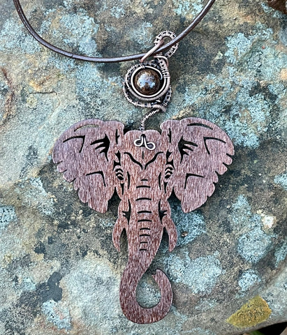 Lazer Cut Aspen Wood Elephant Necklace with a Wire Wrapped Copper Bail with Bronzite Bead. 