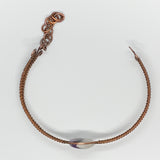 White and Deep Purple Dog Tooth Amethyst in this woven copper bracelet.