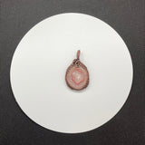 Lovely Pink Agate Pendant with a fluffy white center in Wire Wrapped Copper. 