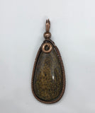 Gorgeous Bronzite wrapped in handwoven copper.