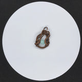 Intricately Woven Copper and Amazonite Pendant.