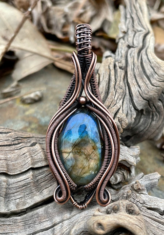 Colorful Labradorite Pendant wrapped in handwoven and coiled copper.