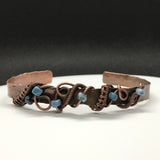 Hammered Copper Cuff with woven Copper and blue and white glass Beads