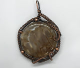Distinctive Agate in Copper Pendant. Intricately woven and beaded