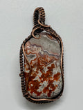Vibrant Tumbled Mexican Lace Agate Pendant in Copper