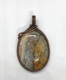 Crazy Lace Agate Pendant wrapped in Copper