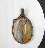 Crazy Lace Agate Pendant wrapped in Copper