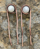 These Heavy Gauge Wire Wrapped Copper Hair Clips/Forks/Barrettes with White Moonstone are elegant and functional accessories that combine the durability of heavy gauge copper with the ethereal beauty of white moonstones. The artisanal craftsmanship and unique design make these pieces a standout choice for those who appreciate stylish and well-made hair accessories.