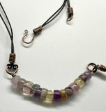 Multi-colored tumbled Fluorite, Copper and Leather Necklace.  