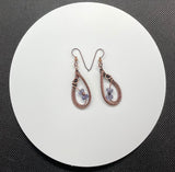 Wire Wrapped Copper Earrings with light purple Czech Glass Beads on Niobium Ear Wires.  