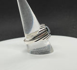 Bold Sterling Silver Ridged Ring with a 12x10mm Hematite and an oxidized finish that highlights the ridges. 