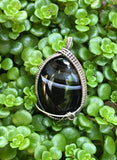 Banded Agate wrapped in Sterling Silver Pendant