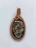 Beautiful Copper Ore Pendant with greens, quartz and copper mixed - wrapped in handwoven shiny copper.