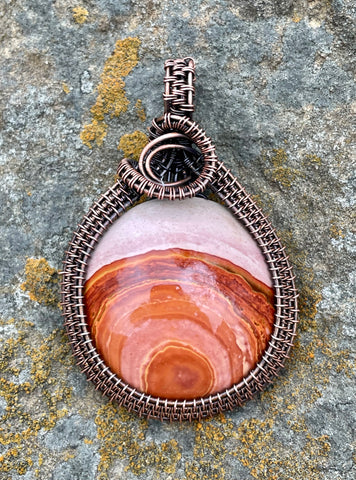 Round, Vibrant Pink, Orange and Yellow Polychrome Jasper Pendant in Wire Wrapped Copper. 