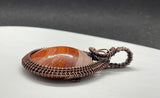Round, Vibrant Pink, Orange and Yellow Polychrome Jasper Pendant in Wire Wrapped Copper. 