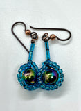 Electroplated Hematite Earrings in Copper surrounded by Azure Blue Sead Beads with Niobium Ear Wires. 